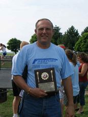 Superintendent receiving his award
